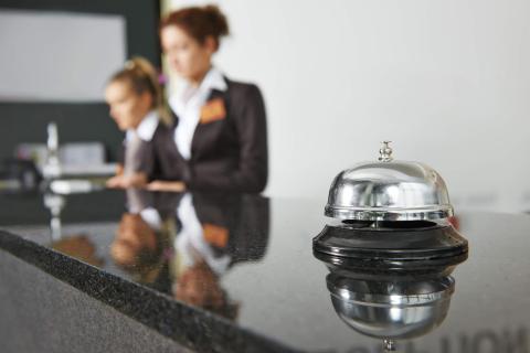 Receptionists at a hotel reception